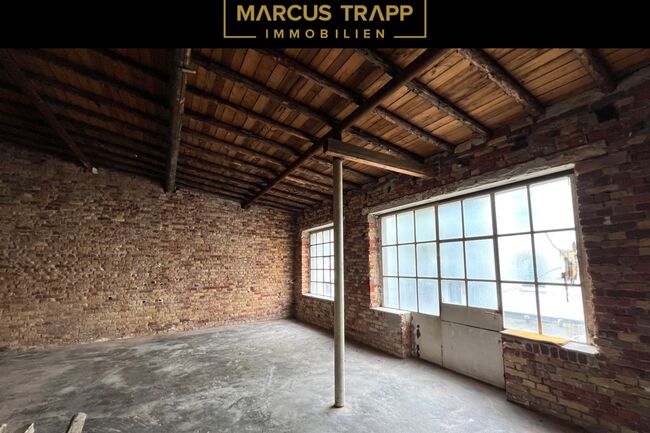 Startbild_Logo_Marcus Trapp Immobilien_schwarz mit KW